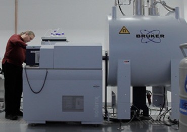 Dr. Petr Novak with the mass spectrometry platform he uses for characterizing NK cells