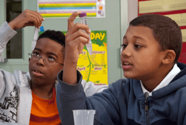 Students looking at their DNA