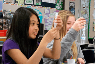 Students looking at their DNA